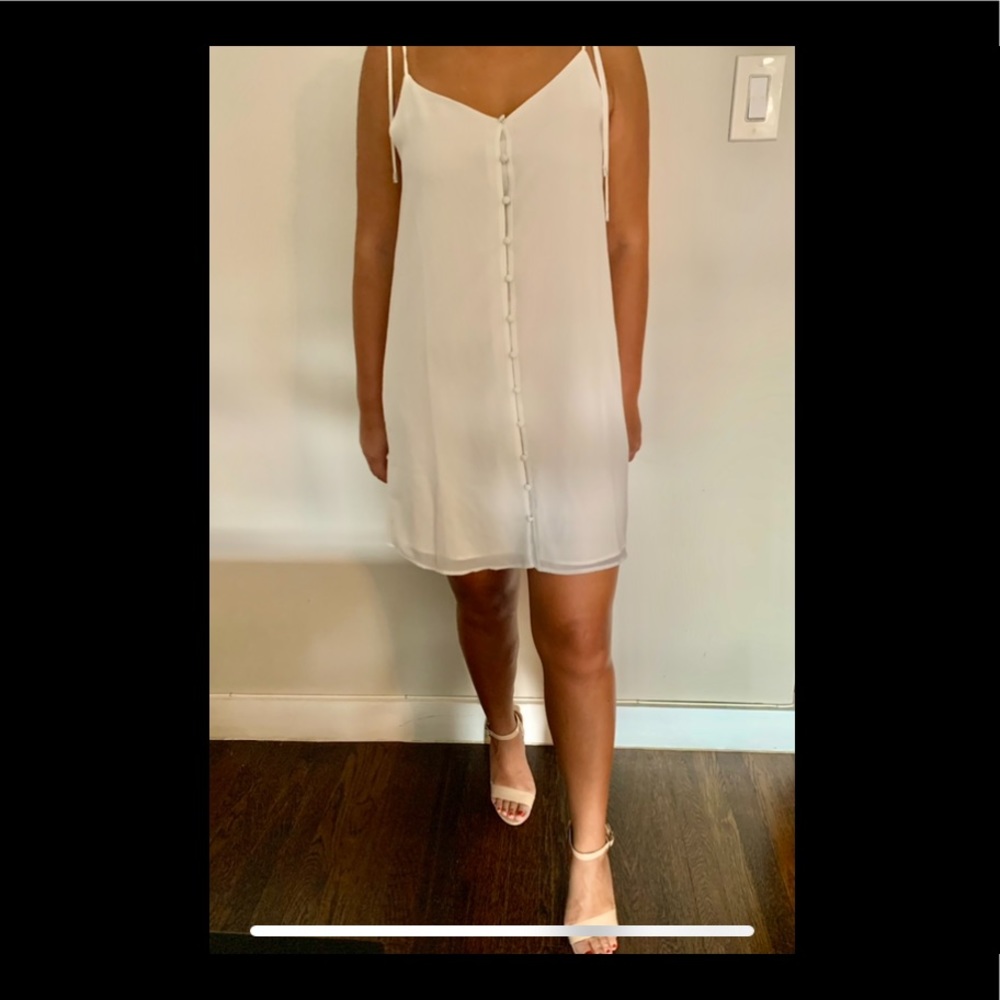 White button shift dress and tie straps